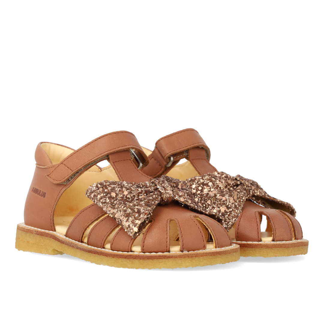Sandal mit Glitzerschleife und Klettverschluss