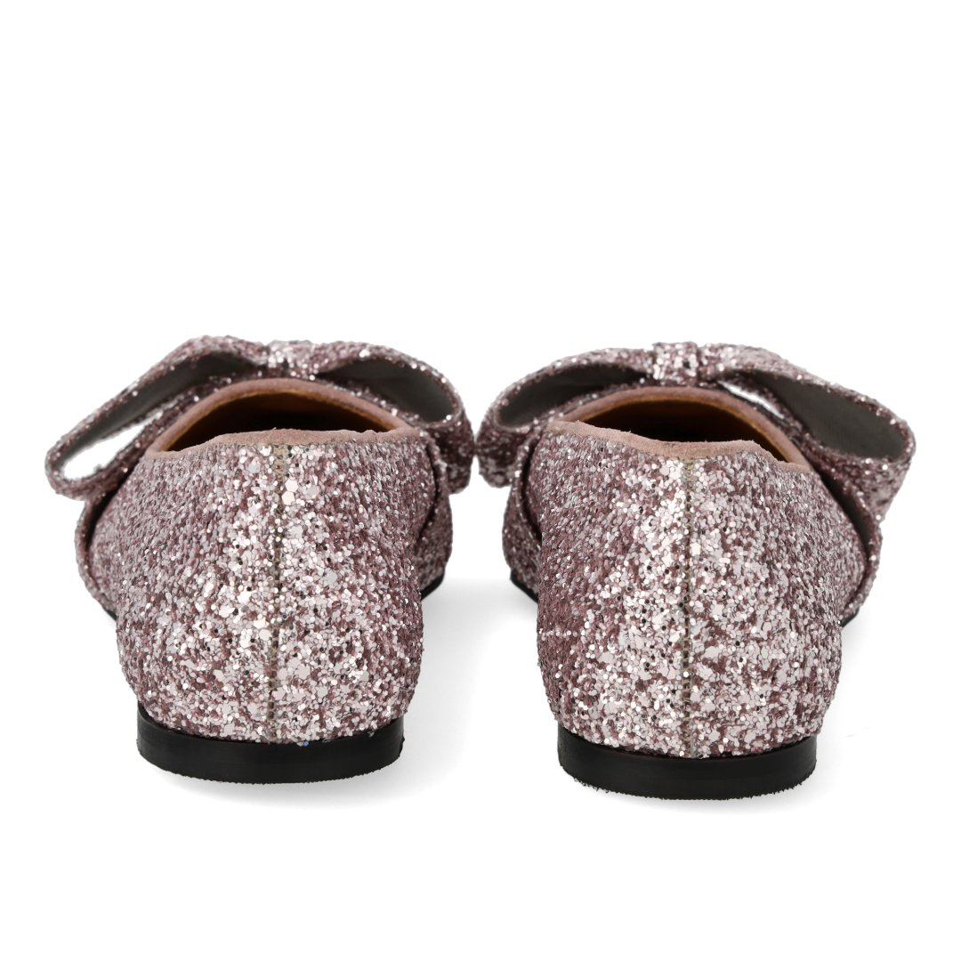 Ballerina mit Schleife in funkelndem Glitzer