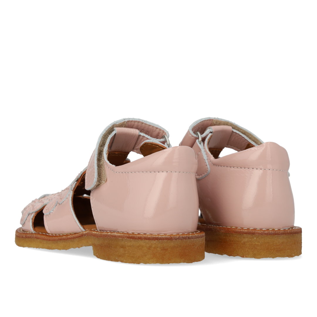 Sandale mit geschlossener Spitze und Blumendetails