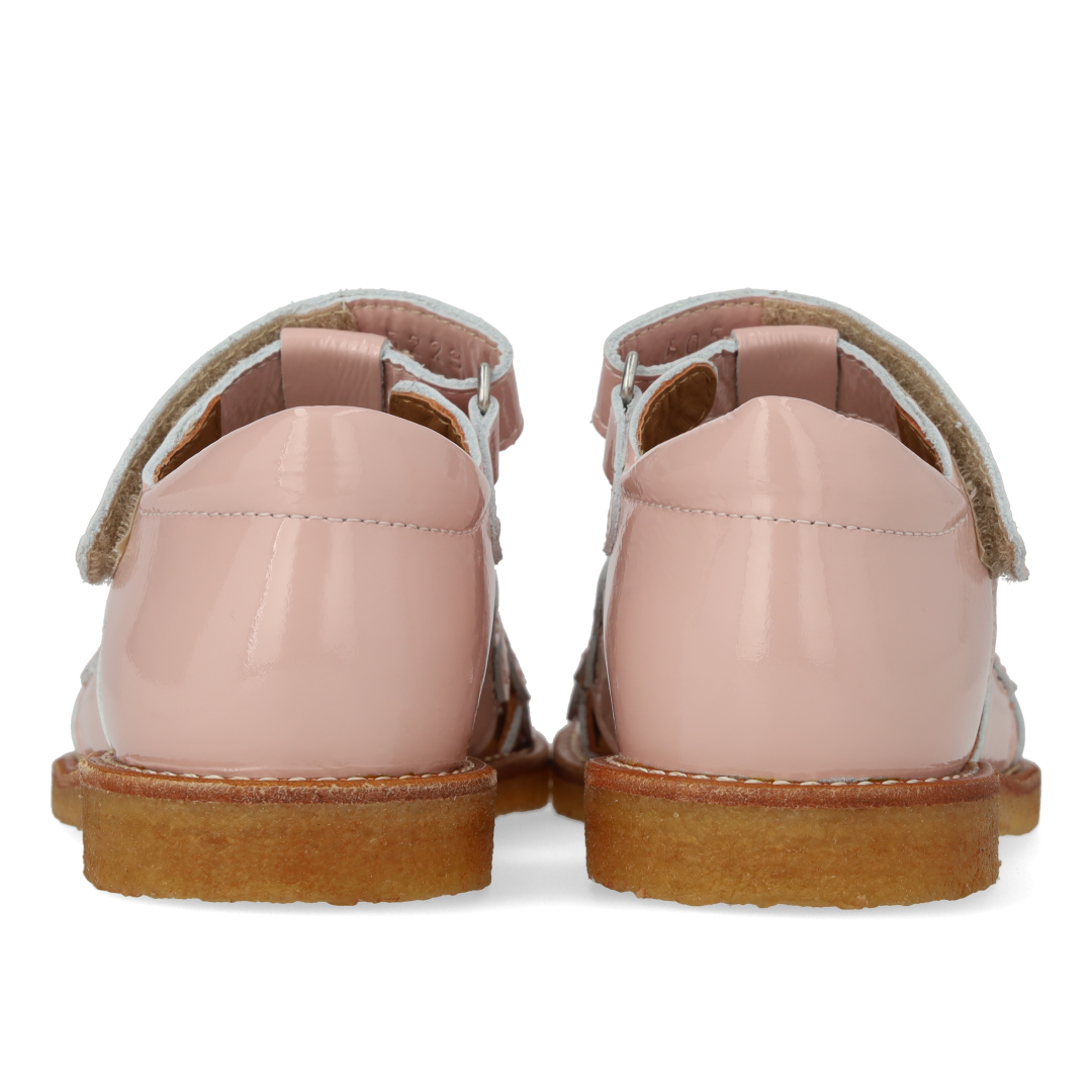 Sandale mit geschlossener Spitze und Blumendetails