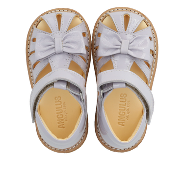 Lauflern-Sandale mit Schleife und Klettverschluss