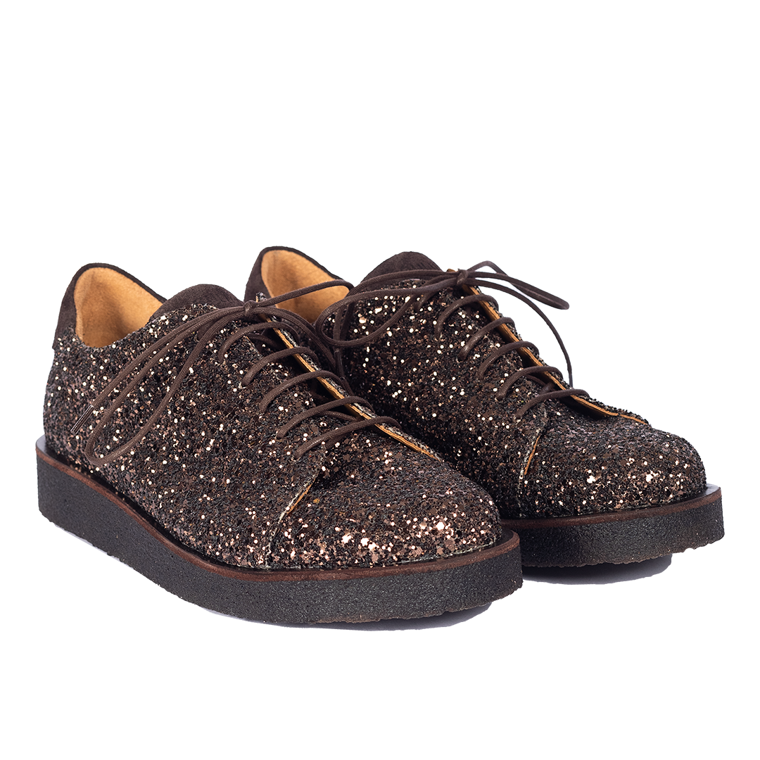 Sneaker mit Glitzer auf Plateausohle