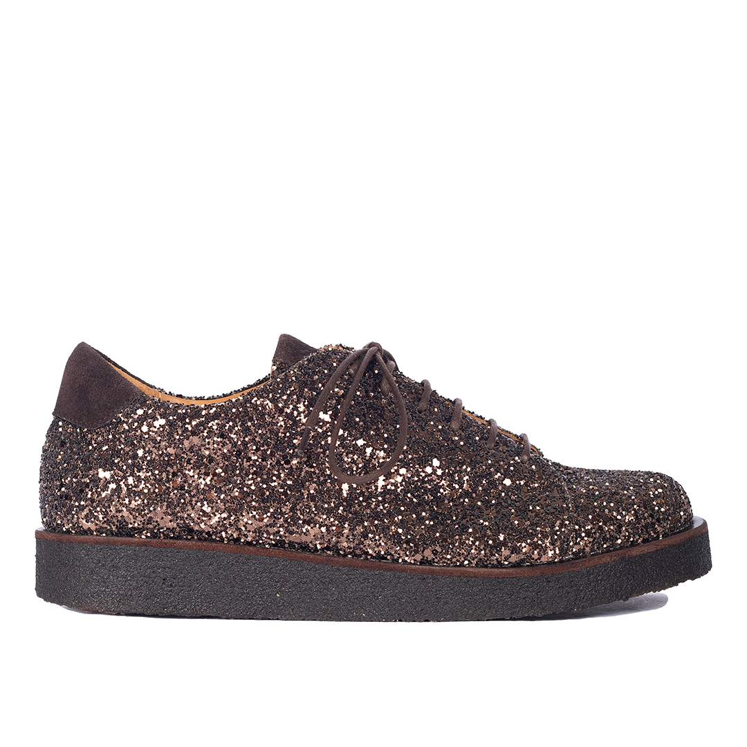 Sneaker mit Glitzer auf Plateausohle