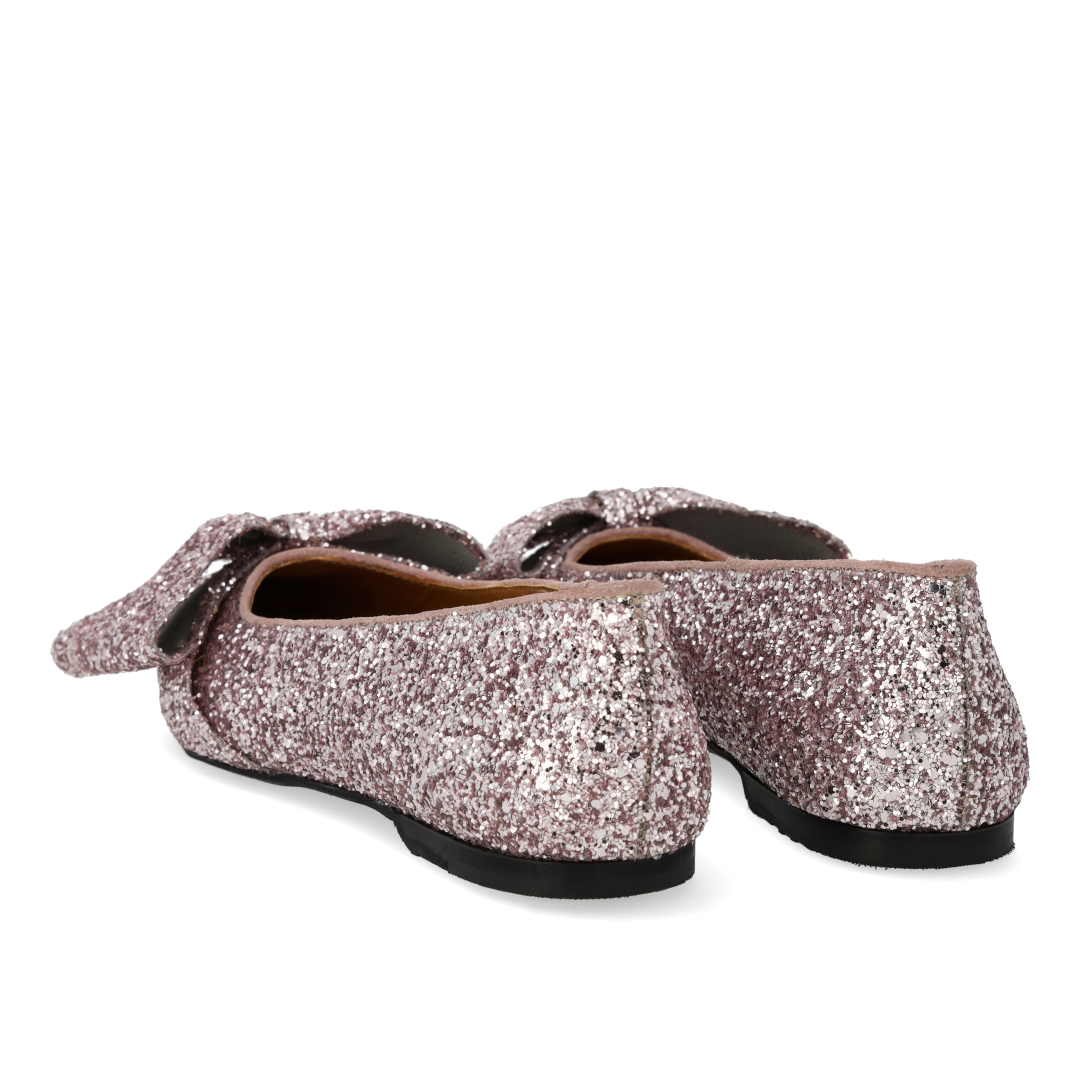 Ballerina mit Schleife in funkelndem Glitzer