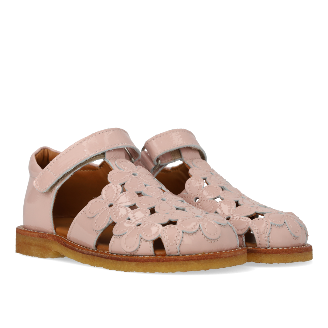 Sandale mit geschlossener Spitze und Blumendetails